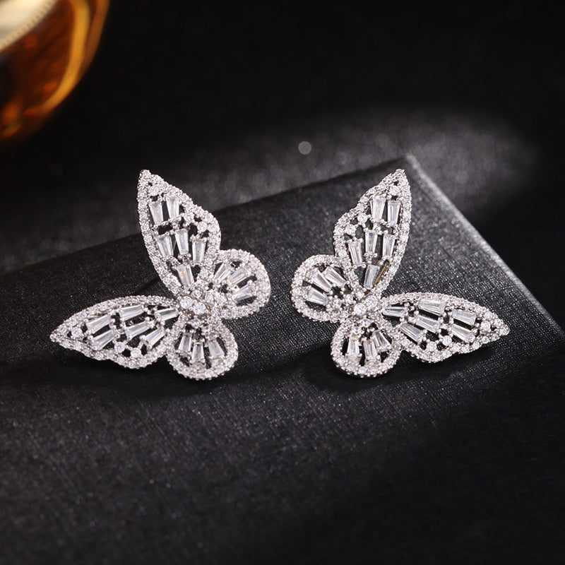 Hollow pink zircon butterfly earrings Ainnua