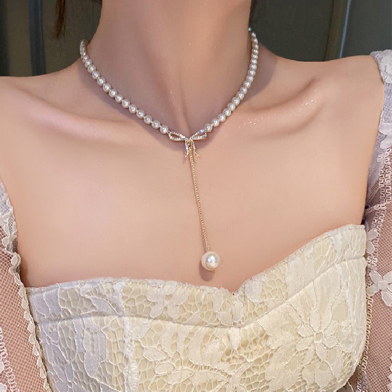 Bow pearl pendant necklace Ainuua
