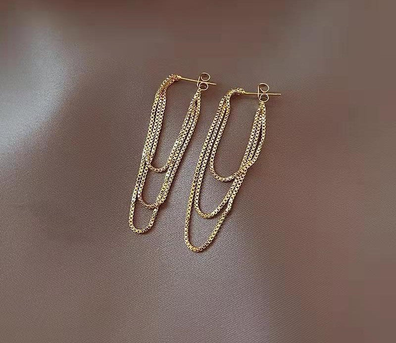 Roud long chain tassel earrings Ainuua
